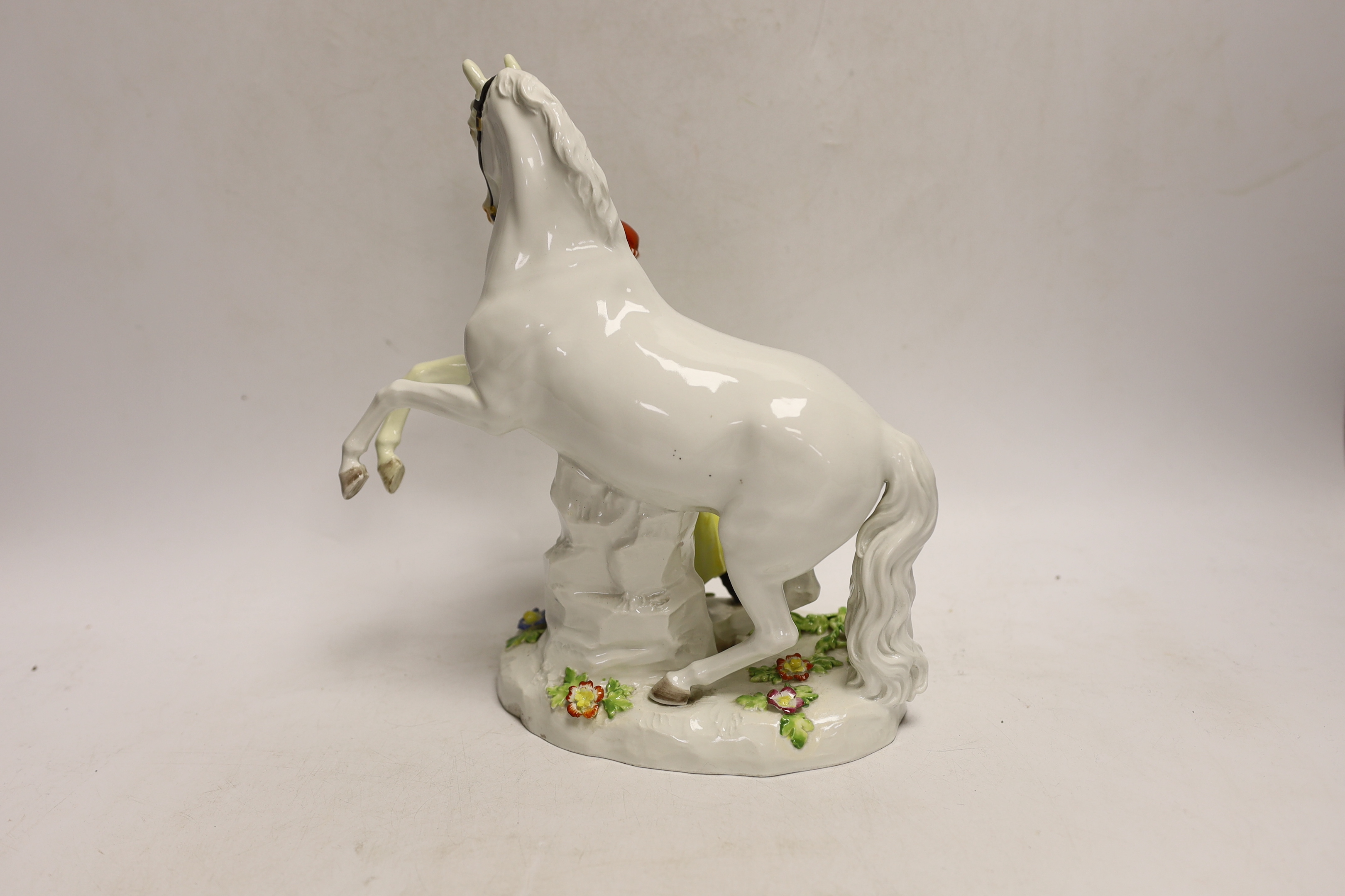 A 19th century Meissen group of a grey horse and groom, 24cm